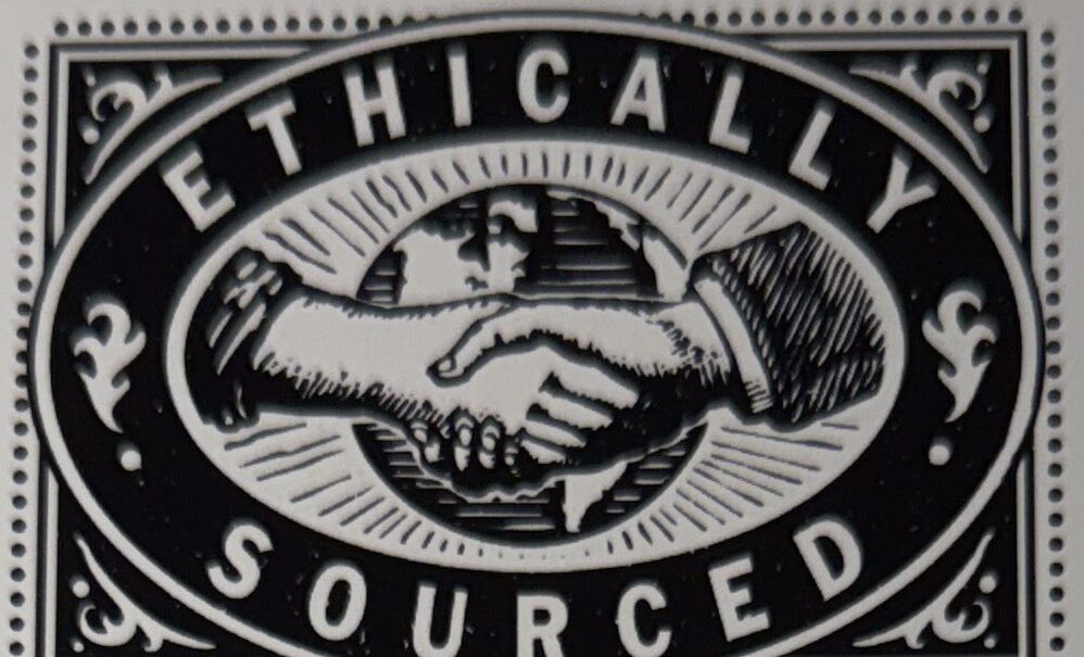 Ethically Sourced trademark logo showing two hands shaking in front of a globe inside an oval